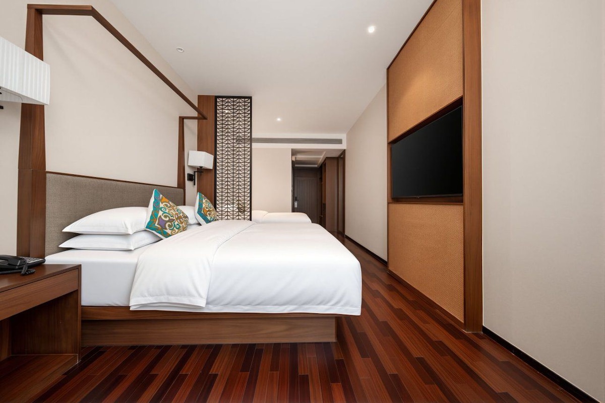 Deluxe Family Triple Room | Premium bedding, down comforters, memory foam beds, minibar (free items)