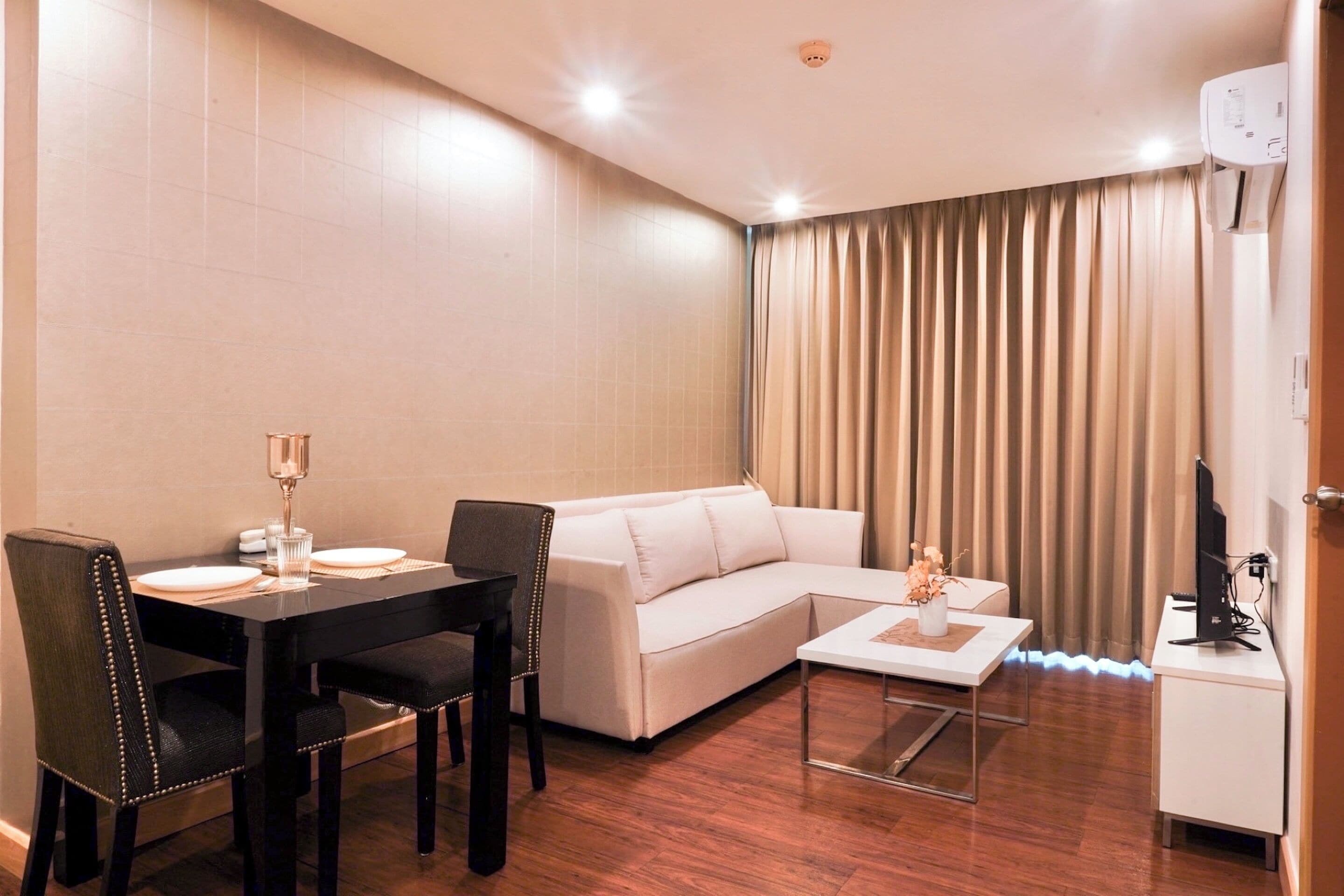 Junior Suite | Living area | 43-inch Smart TV with satellite channels