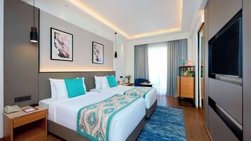 Deluxe Room, 2 Twin Beds, Balcony | Minibar, in-room safe, desk, laptop workspace