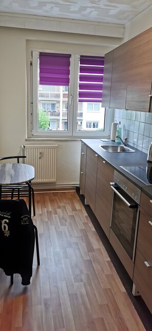 Fridge, coffee/tea maker, cookware/dishes/utensils