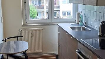 Fridge, coffee/tea maker, cookware/dishes/utensils