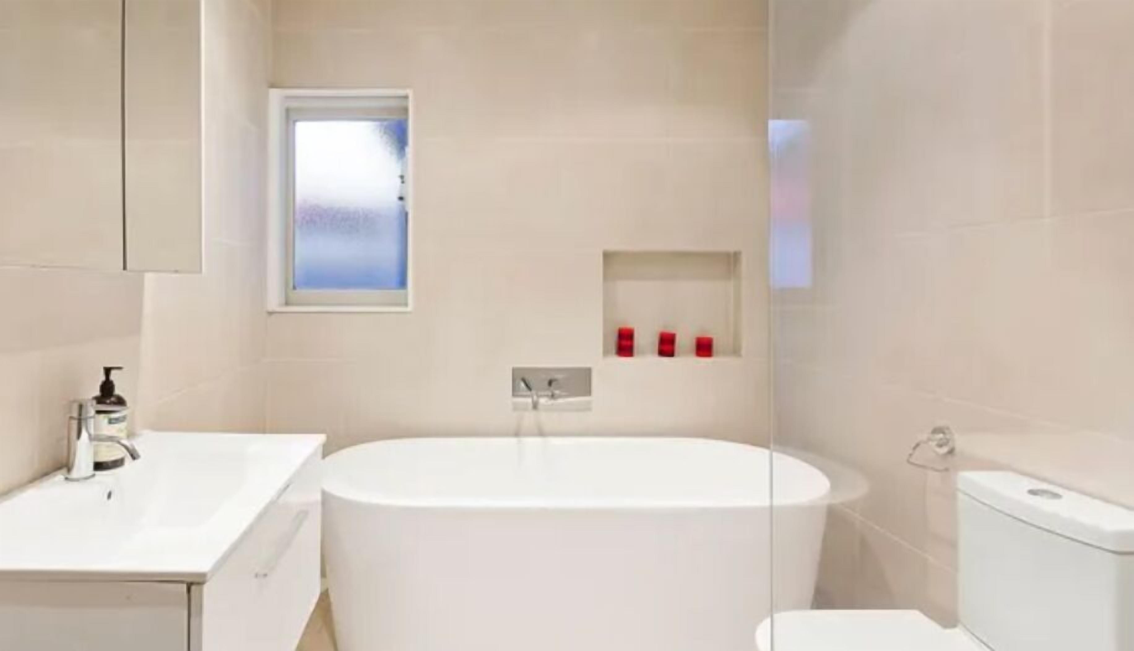 Shower, towels, soap, toilet paper