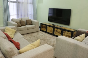 Smart TV, printers - At Home Suites in Arusha, a blend of simplicity, comfort and luxury awaits! (Arusha)