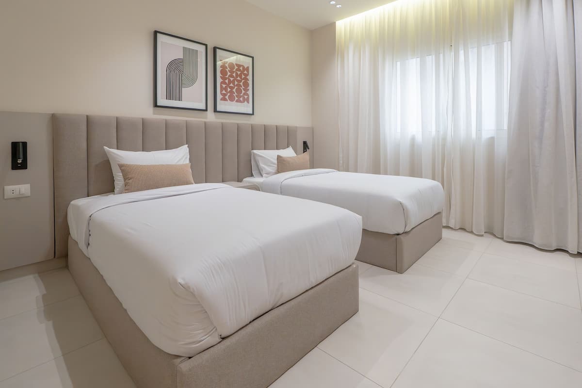 Apartment, 3 Bedrooms | 2 bedrooms, minibar, iron/ironing board, cribs/infant beds