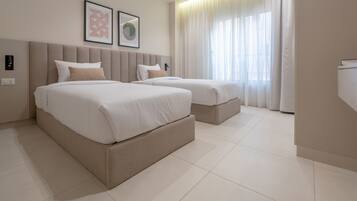 Apartment, 3 Bedrooms | 2 bedrooms, minibar, iron/ironing board, cribs/infant beds