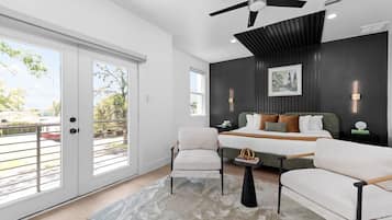 3 habitaciones, escritorio y tabla de planchar con plancha