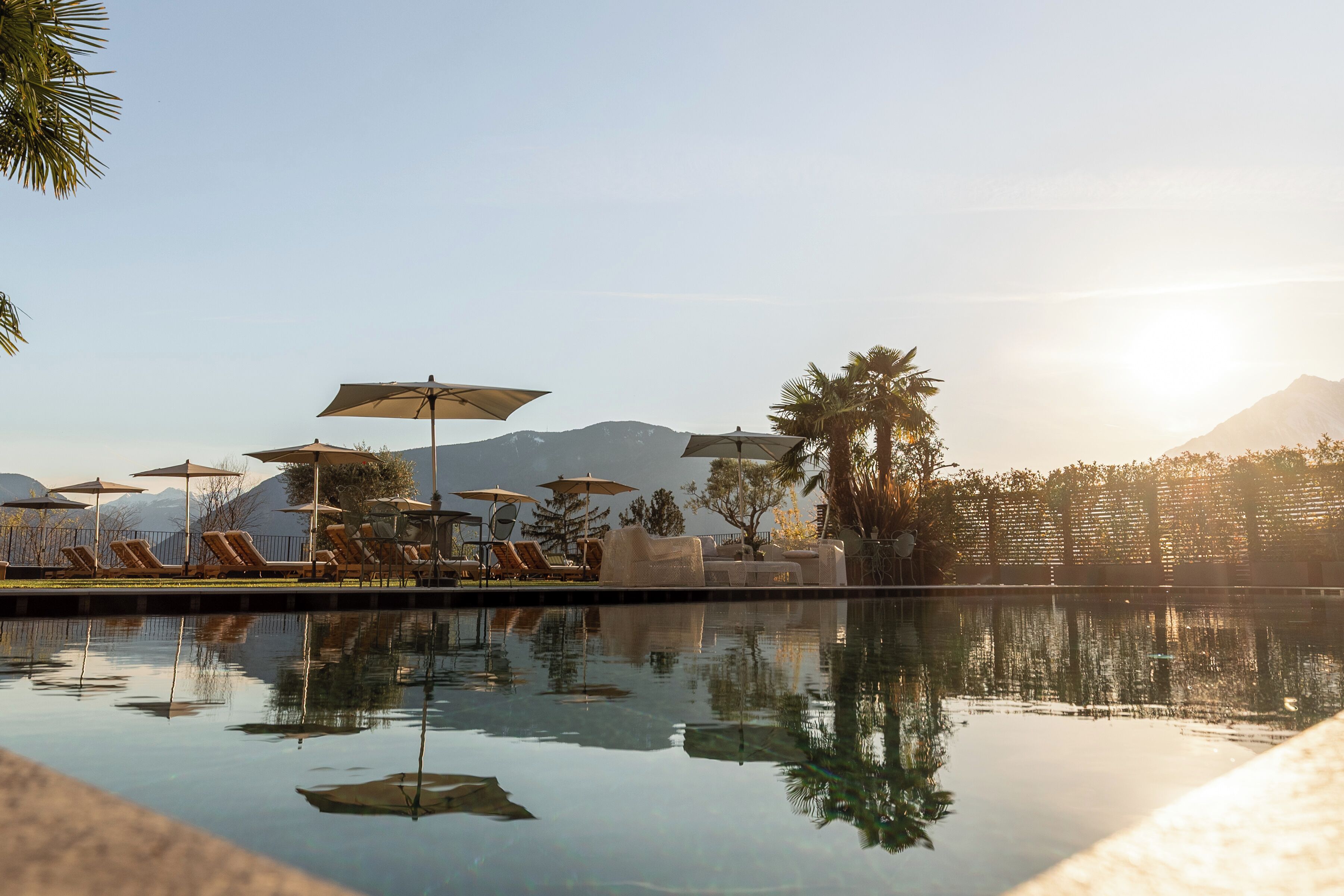 Indoor pool, seasonal outdoor pool, pool umbrellas, pool loungers