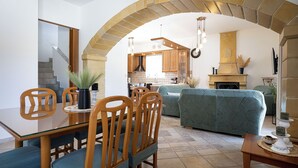 Family Villa, Mountain View | Living area | Flat-screen TV, fireplace