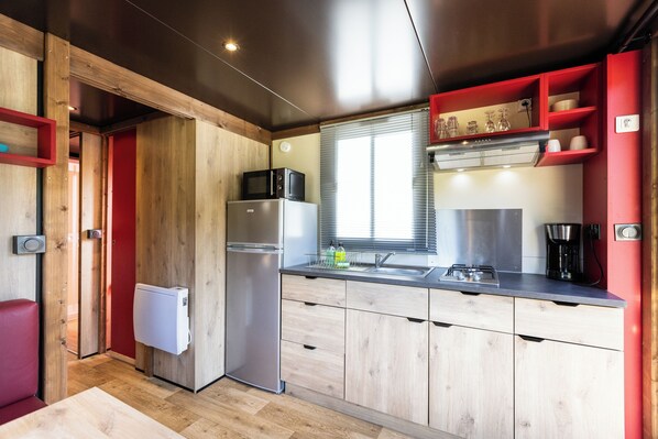 Chalet | Private kitchen | Coffee/tea maker, high chair, cleaning supplies