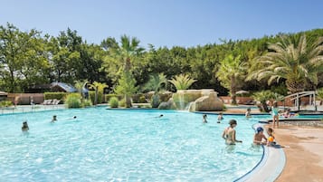 Seasonal outdoor pool, open 9:30 AM to 7:00 PM, pool umbrellas