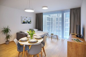 Exclusive Apartment, 1 Bedroom, Non Smoking, Courtyard View | Living area | 60-cm LED TV with satellite channels
