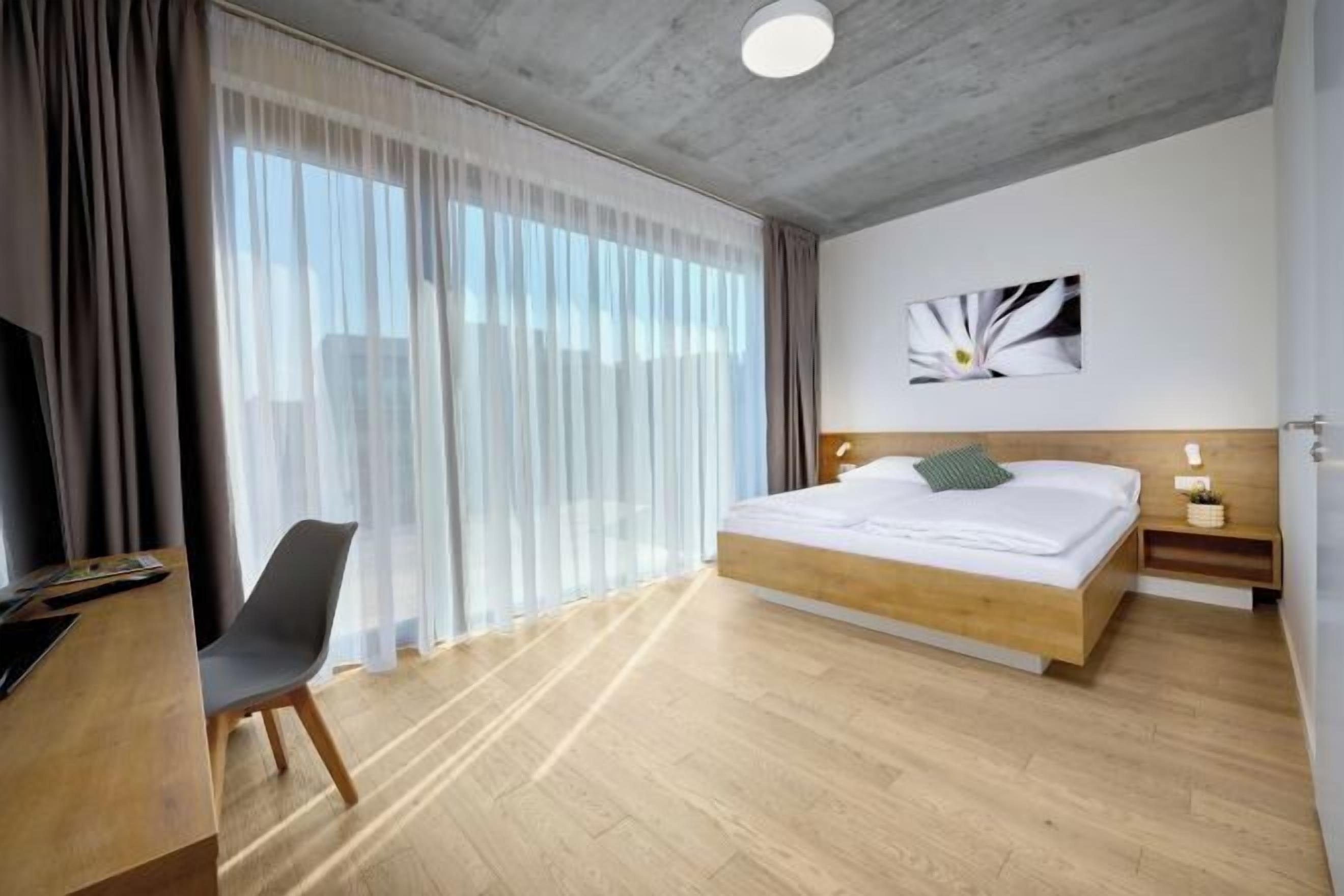 Kannettavalle tietokoneelle sopiva työtila, silitysrauta/-lauta