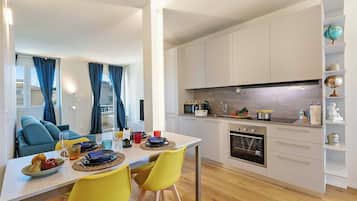 Family Apartment, 2 Bedrooms, Balcony (Appartamento Nina - 1 Km To The Beach) | Private kitchen | Fridge, microwave, oven, stovetop