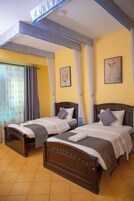 Family Apartment, 3 Bedrooms, City View | Desk, laptop workspace, soundproofing, iron/ironing board