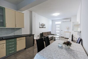 Appartement Classique, vue jardin | Coin séjour