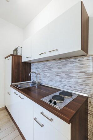 Standard-Studio, Balkon, Stadtblick | Eigene Küche