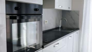 Superior Apartment, Balcony, City View | Private kitchen | Fridge