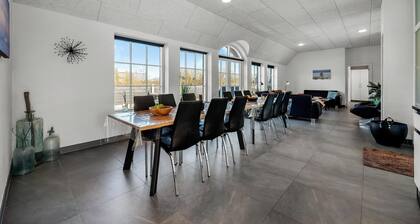 Large 16-person holiday home with pool, hot tub and sauna.