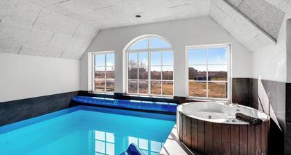 Large 16-person holiday home with pool, hot tub and sauna.