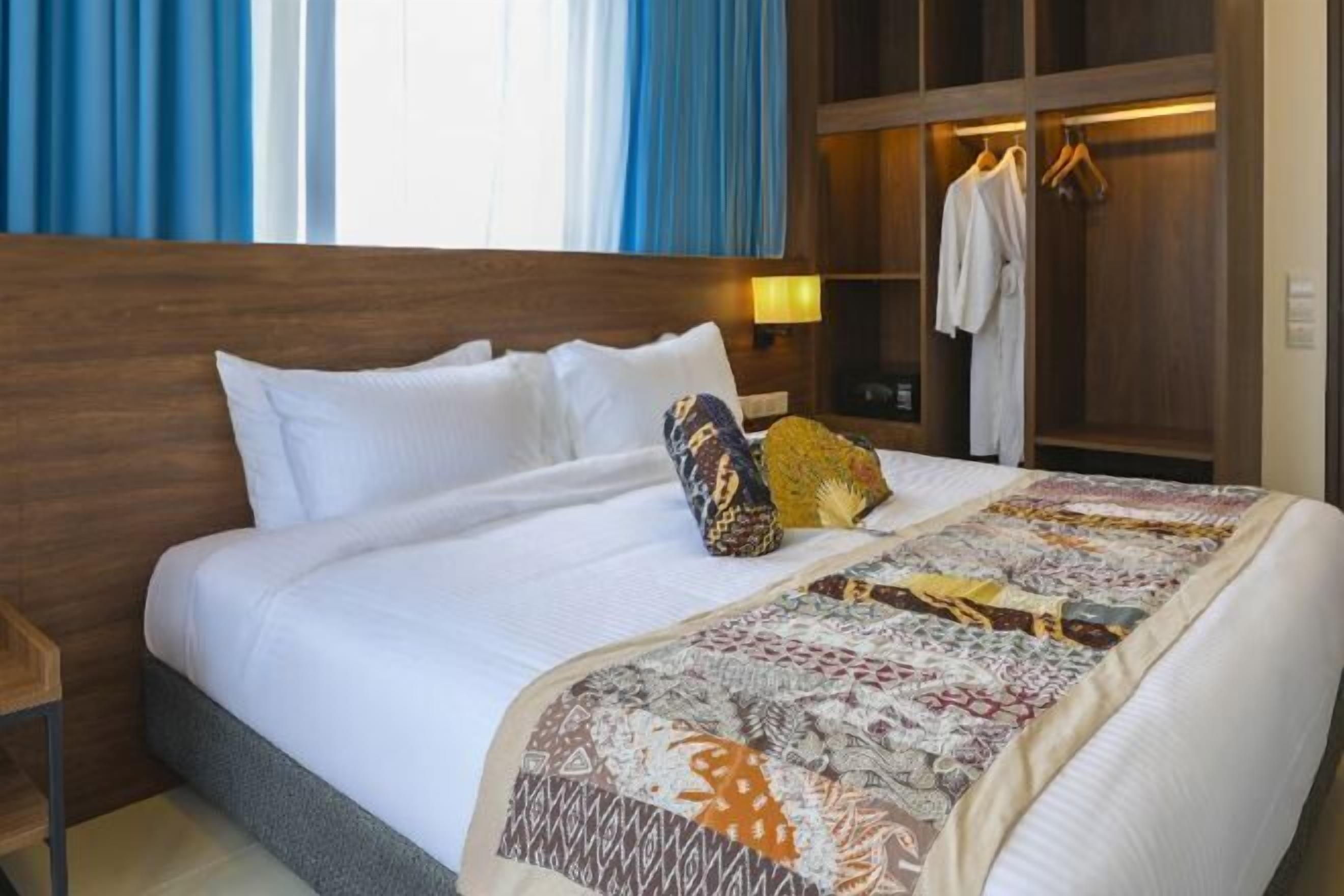 Untuvapeitot, minibaari, ilmainen Wi-Fi, vuodevaatteet