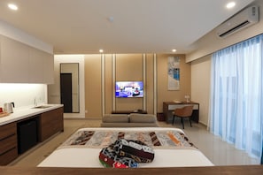 Junior Suite | 2 bedrooms, down comforters, minibar, free WiFi