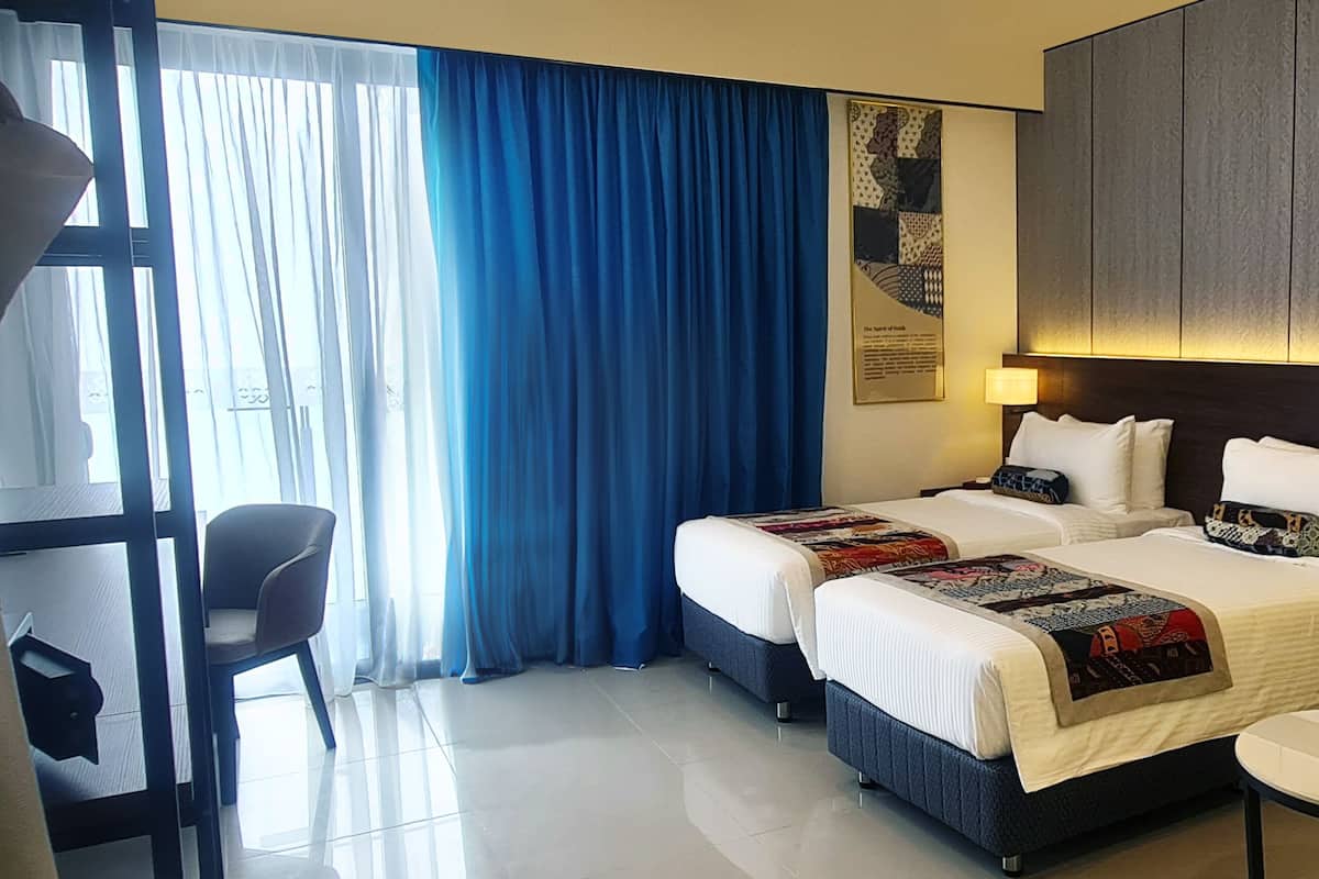 Estudio, 2 camas individuales | 2 habitaciones, edredón, minibar y wifi gratis