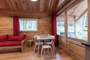 Deluxe Chalet | Living area | Foosball, table tennis