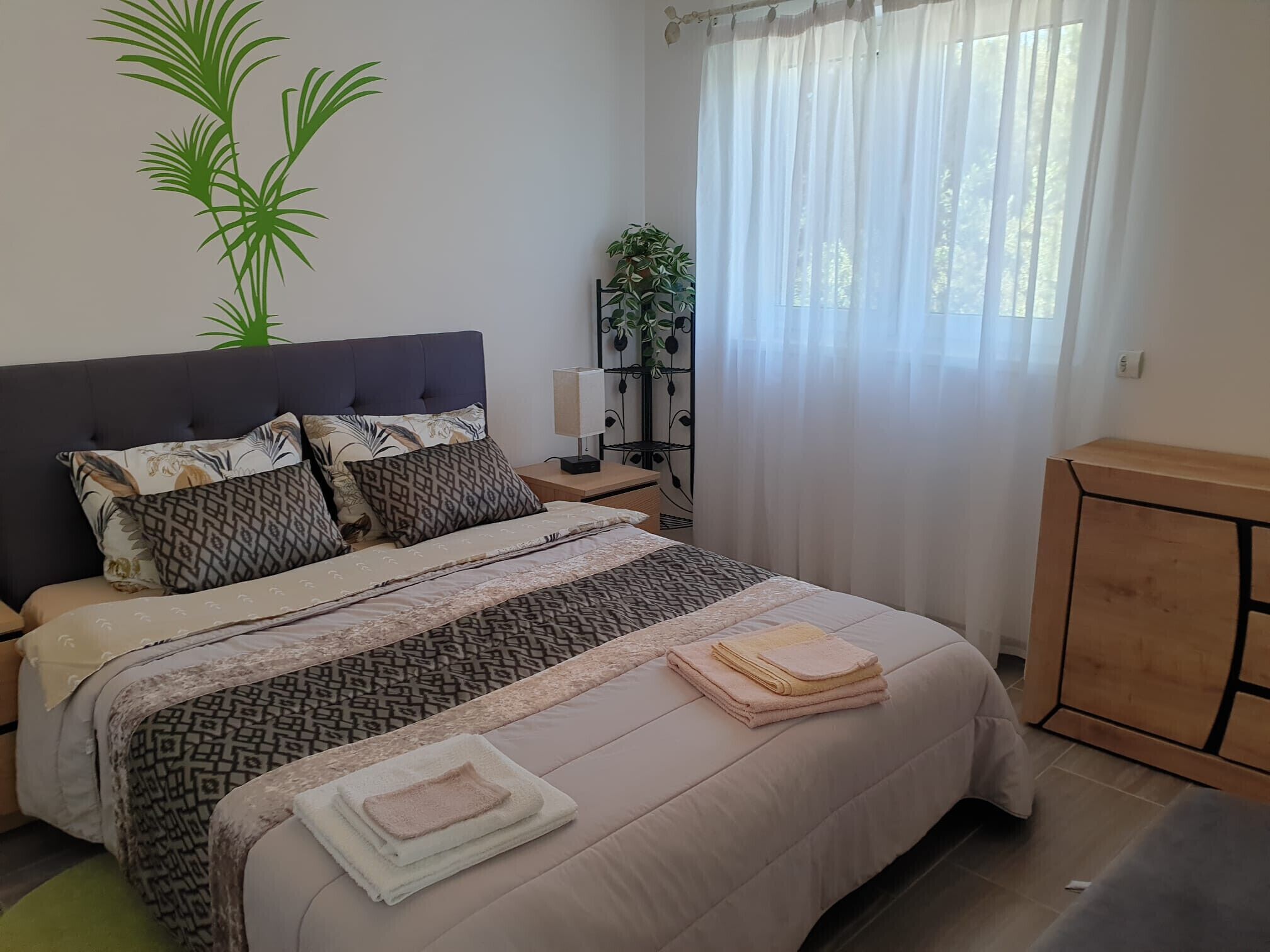 1 bedroom, desk, iron/ironing board, travel crib