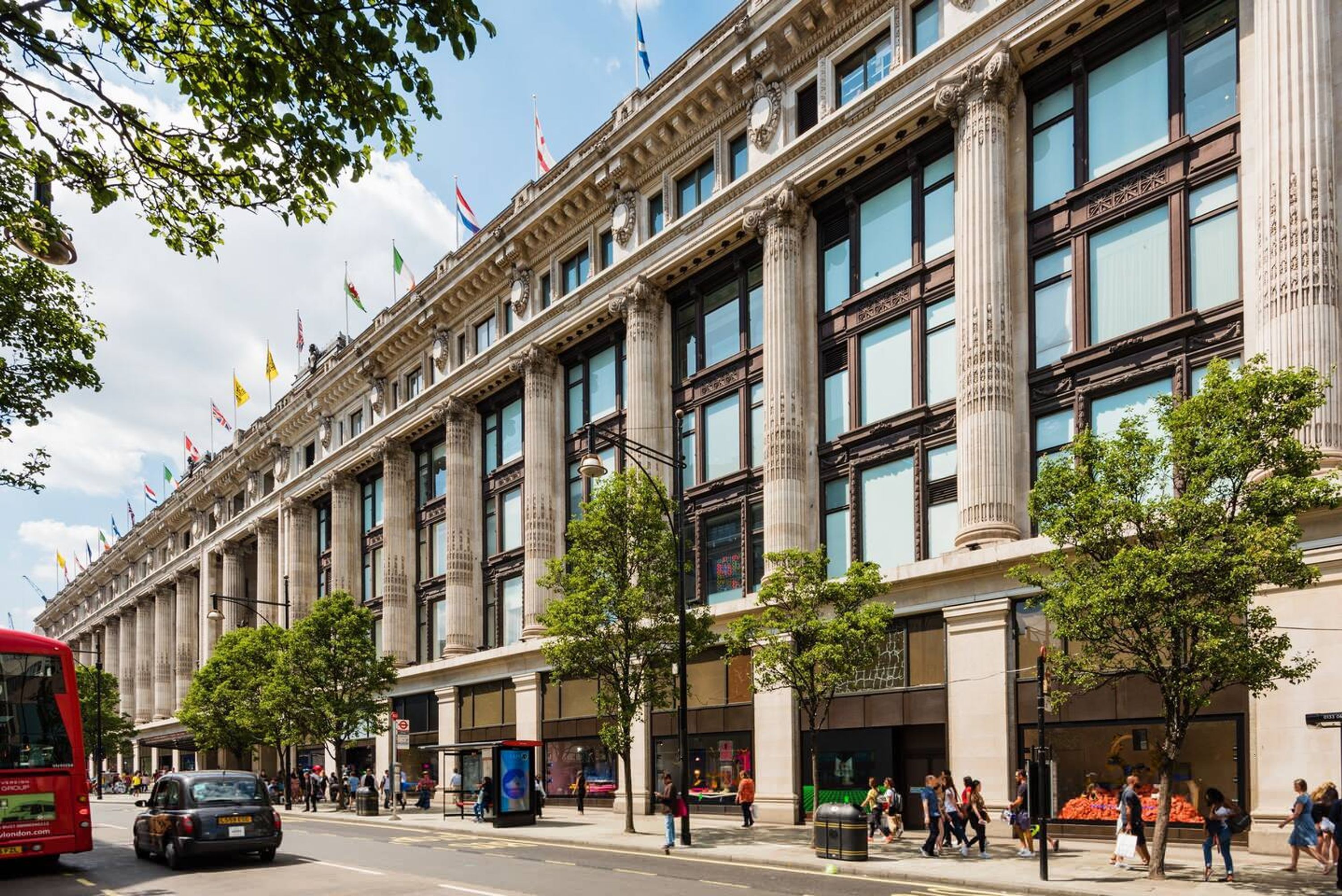 A large, historic building with classical architecture, featuring tall columns and large windows.