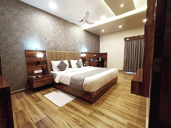 Comfort Suite, Balcony, City View | Desk, laptop workspace, blackout drapes, iron/ironing board - THE KASHI RESIDENCY  (Varanasi)