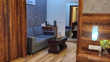 Comfort Suite, Balcony, City View | Living area | Printers