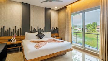 Family Room, Balcony, City View | Blackout curtains, iron/ironing board, free WiFi