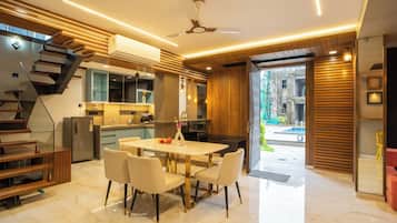 Family Room, Balcony, City View | Living area | TV