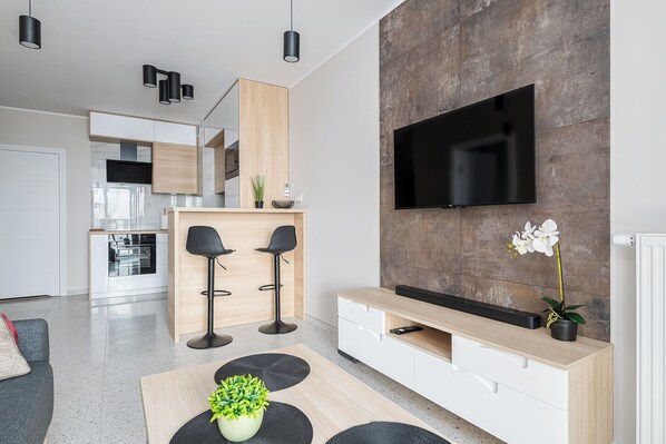 Apartment, Balcony | Living area | 37-inch flat-screen TV with digital channels