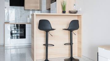 Apartment, Balcony | Living area | 37-inch flat-screen TV with digital channels