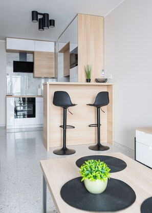 Apartment, Balcony | Living area | 37-inch flat-screen TV with digital channels