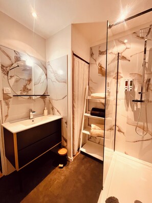 Shower, hair dryer, towels, soap