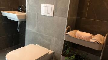 Hårføner, håndklær, såpe og sjampo