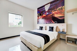 Standard Double Room | Premium bedding, soundproofing, free WiFi, bed sheets - Dancenter Promenade Near Cihampelas Walk (Bandung)