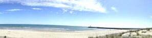 On the beach, sun-loungers, beach towels