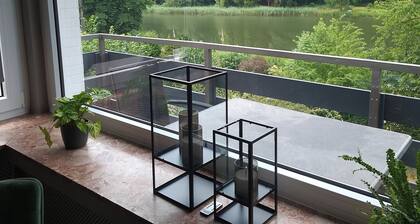 River view! modern vacation apartment with balcony, at the cycle path Fulda+Weser