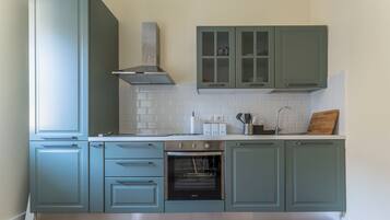 Apartment | Private kitchen | Full-sized fridge, oven, stovetop, dishwasher