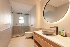 Shower, hair dryer, towels, soap