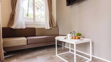 Comfort Mobile Home, Garden View | Living area | 26-inch LCD TV with cable channels