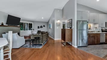 Signature House, 4 Bedrooms, Non Smoking, Kitchen | Living room | 50-inch Smart TV with digital channels