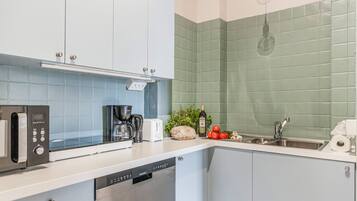 Microwave, stovetop, coffee/tea maker, toaster