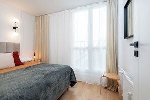 Familie appartement, uitzicht op de stad | 2 slaapkamers, een kluis op de kamer, individueel gedecoreerd