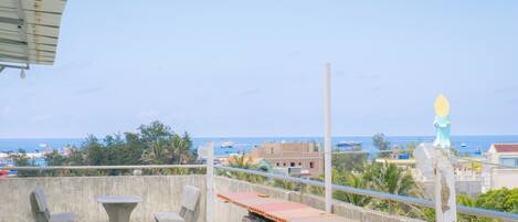 Triple Room, Multiple Beds, Pets Allowed, Ocean View | Desk, blackout drapes, soundproofing