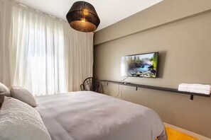 3 habitaciones, tabla de planchar con plancha, wifi y ropa de cama 