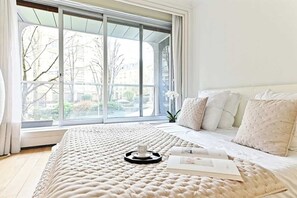 1 slaapkamer, een strijkplank/strijkijzer, wifi, beddengoed